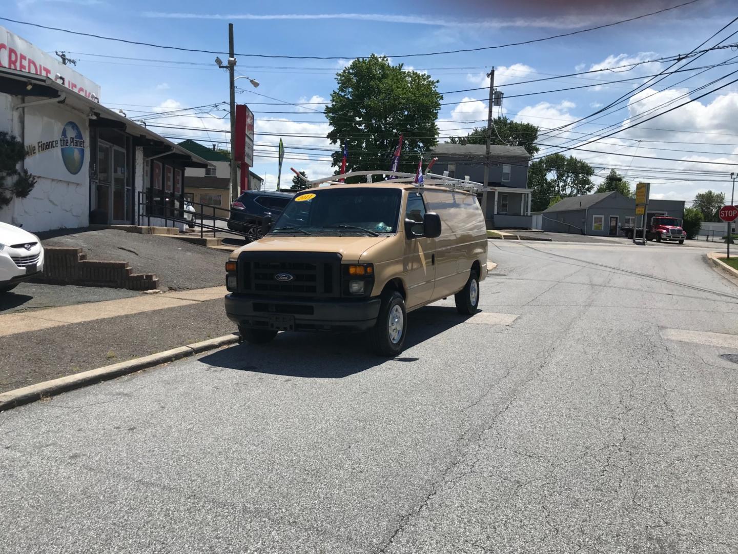 2011 Tan /Gray Ford E-Series Van E250 (1FTNE2EW5BD) with an 4.8 V8 engine, Automatic transmission, located at 577 Chester Pike, Prospect Park, PA, 19076, (610) 237-1015, 39.886154, -75.302338 - 2011 Ford E250 Cargo Van: Ladder racks, shelving, heavy duty partition, power inverter, fully metal body, FLEET MAINTAINED, runs LIKE NEW! This vehicle comes inspected and has been given a bumper to bumper safety check. It is very clean, reliable, and well maintained. We offer a unique pay plan t - Photo#1